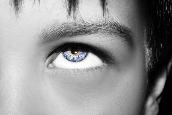 A beautiful insightful look boy's eye. Close up shot. — Stock Photo, Image