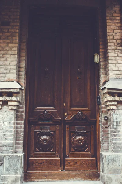 Old Tbilisi architecture,The entrance red door and exterior decor in summer day