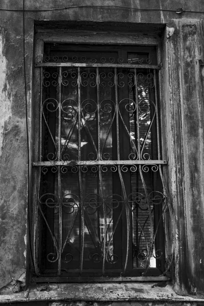 Old Tbilisi architecture, window and exterior decor in summer day