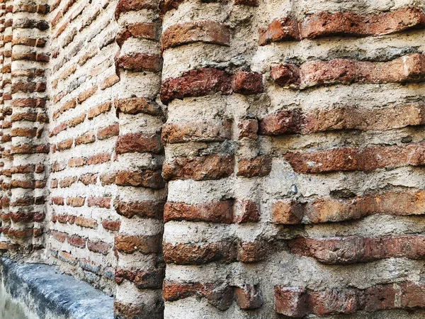 Parede de tijolo. Arquitetura. Pedra velha amarela. Construção de tijolos . — Fotografia de Stock