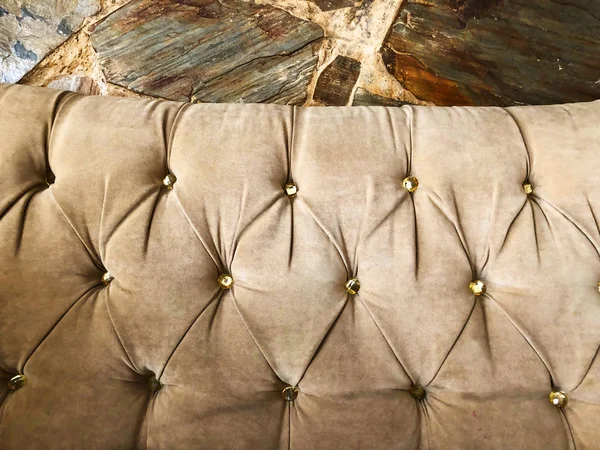 Luxury sofa texture. Light sofa background. Close-up