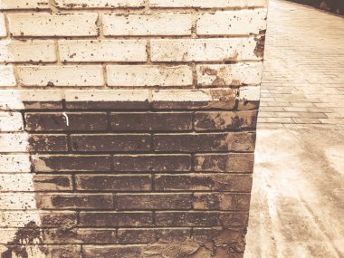 Tuğla duvar Mimarlık. Kahverengi ve sarı taş. Tuğla bina