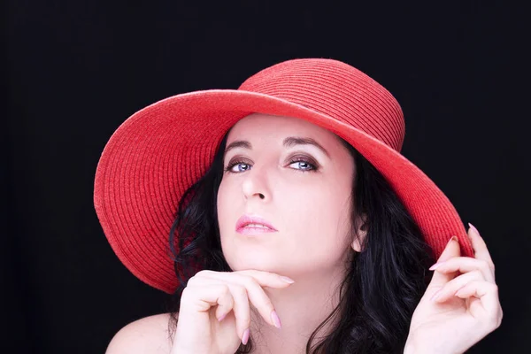 Portrait of a young attractive woman on dark background — Stock Photo, Image