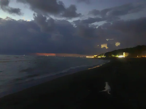 Evening sea view, clouds in the sky, sea, beach