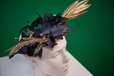 mannequin  on a green  background