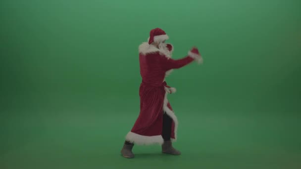 Man Santa Claus Costume Boxing Isolated Green Background — Stok video