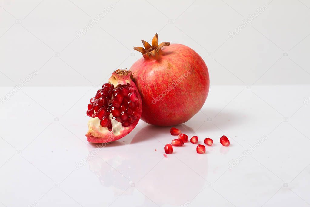 Fruit, pomegranate on white background.