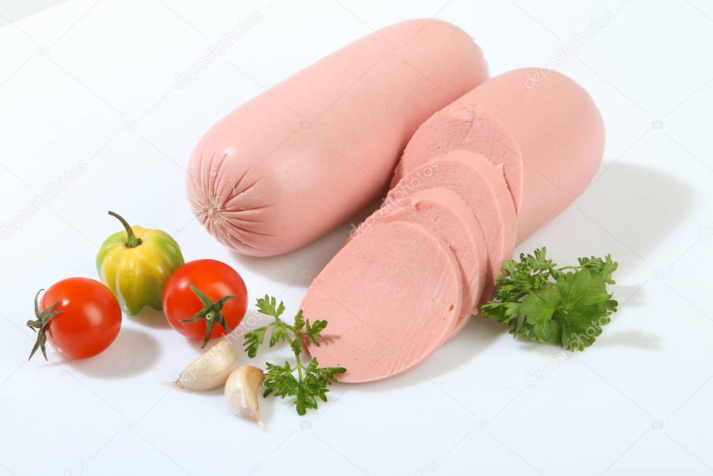 Sausage boiled tender vegetables.