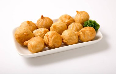 Üzerine kızarmış et köfte .
