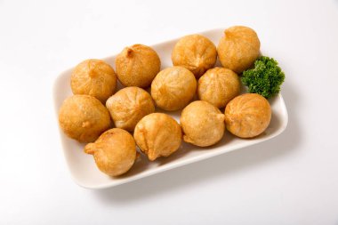 Üzerine kızarmış et köfte .