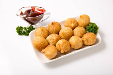 Üzerine kızarmış et köfte .