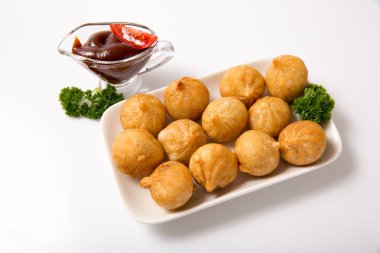 Üzerine kızarmış et köfte .