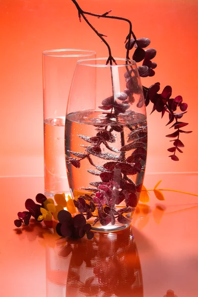 Decorative glass vase with flower .
