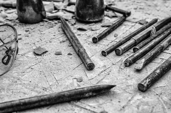 Old tools for carving stone of handmade way, detail of old manual craft