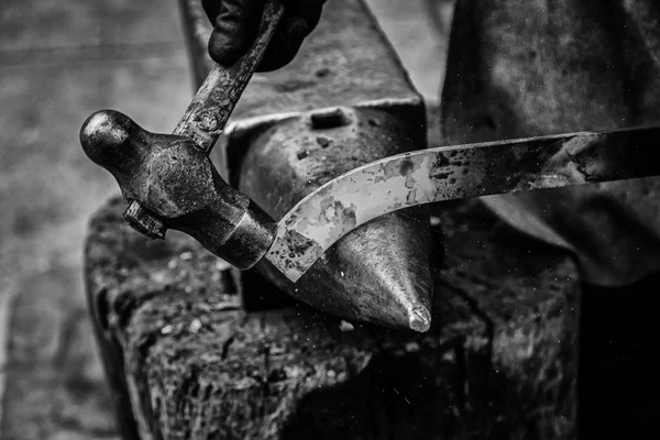 Red hot iron in a forge, working with hot iron, traditional work