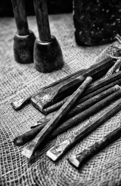 Old tools for carving stone of handmade way, detail of old manual craft