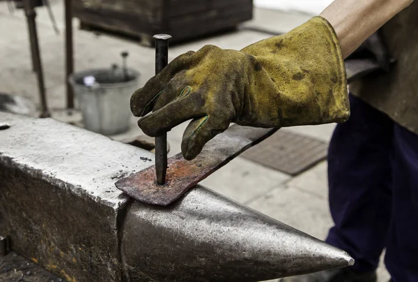 Red hot iron in a forge, working with hot iron, traditional work