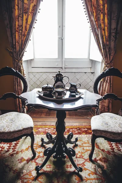 Old table with tea — Stock Photo, Image
