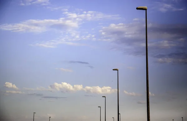 Lampposts with sky background, detail of lighting in the city