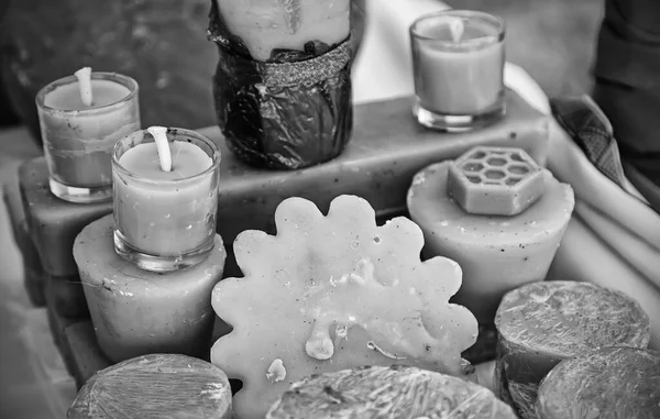 Craft bees wax candles with shapes and smells, detail of traditional crafts, lighting