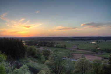 Gadget'ınız için mükemmel bir ekran koruyucu bahar günbatımı mı.