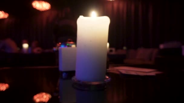 A candle in night club — Stock Video