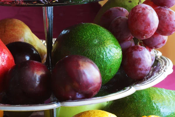 many different fruit on a tray