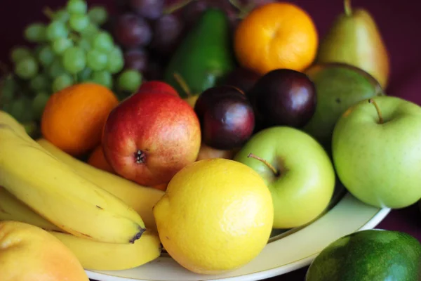 many different fruit on a tray