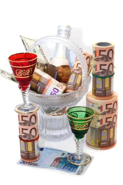 Isolation on a white background, currency, closed the bottle and empty colored glasses — Stock Photo, Image