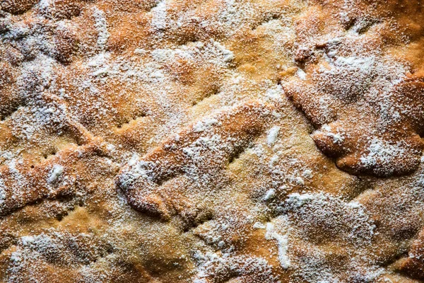 Hintergrund Oder Textur Eine Unebene Oberfläche Des Kuchens Mit Zucker — Stockfoto