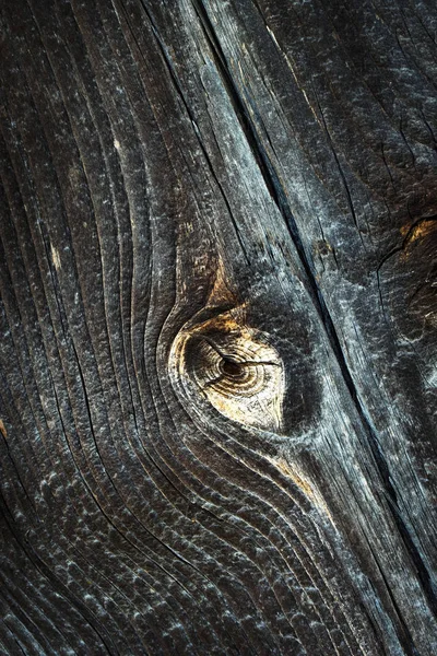 Detail of an old dark wooden board — Stock Photo, Image