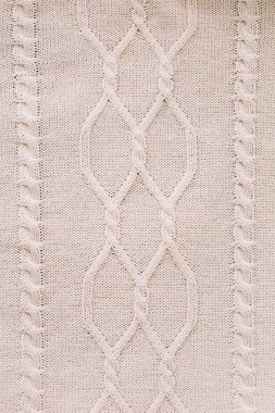 Örme arka plan. Yün örme deseni. Örgü. Duvar kağıdı ve soyut bir arka plan için örme yün kumaş dokusu