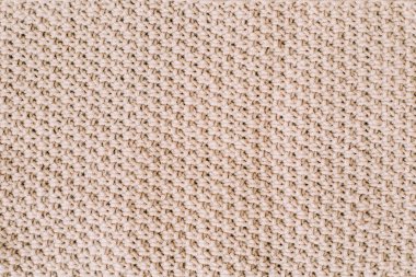 Örme arka plan. Yün örme deseni. Örgü. Duvar kağıdı ve soyut bir arka plan için örme yün kumaş dokusu