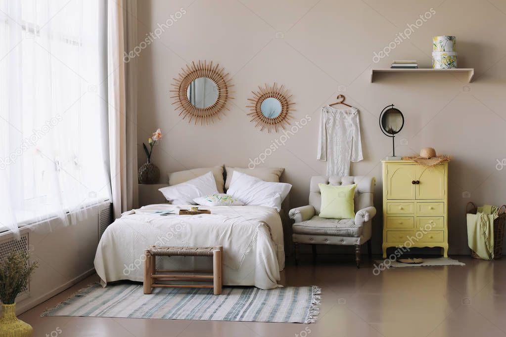 Modern home interior design. Bed with and pillows, blanket. girl's  bedroom interior, scandinavian style 