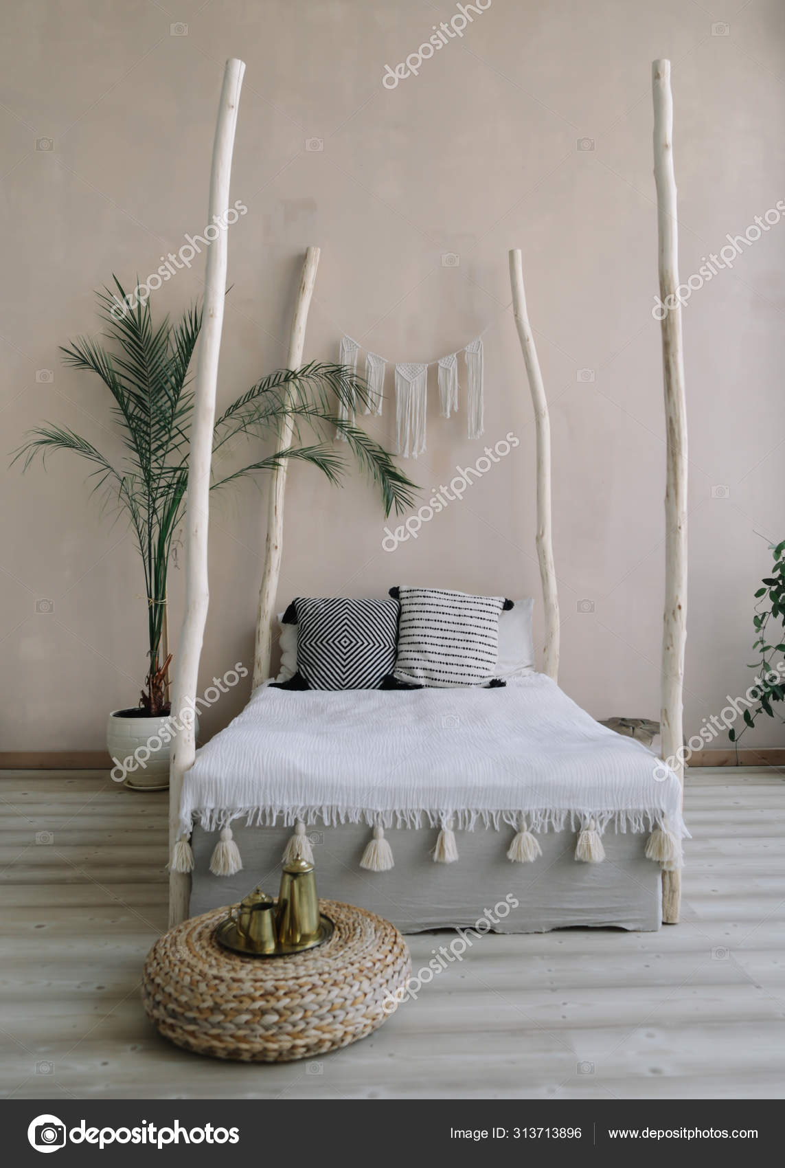 Modern minimal home interior design. Bed with wooden canopy and pillows,  blanket, tropical palm. Exotic bedroom interior, scandinavian style — Stock  Photo © gkondratenko #313713896, image size:1143x1700