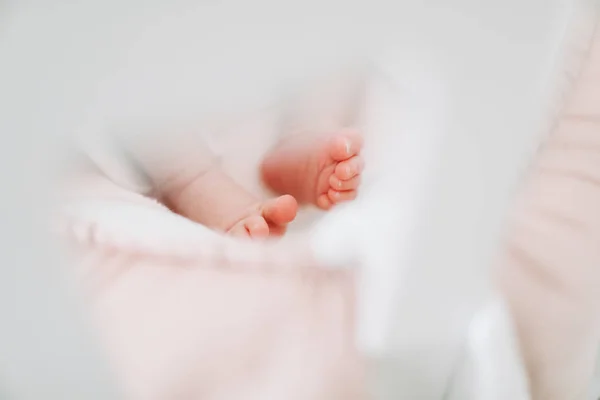 Newborn baby feet closeup. Happy Family concept. conceptual image of Maternity Stock Picture