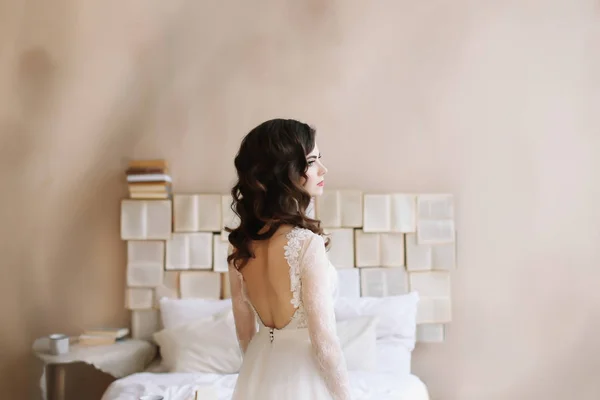 Bride in lingerie. Morning wedding gatherings. tenderness concept. Elegant classic wedding dress. — Stock Photo, Image