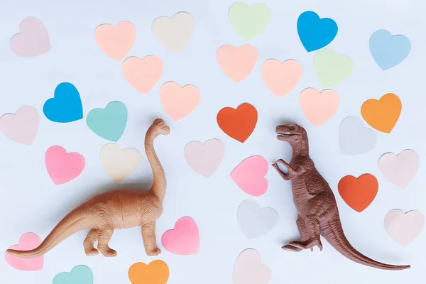 Två Dinosaurier Bakgrunden Färgglada Hjärtan Begreppet Alla Hjärtans Dag — Stockfoto