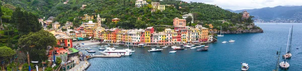 beach streets and colorful houses on the hill in Portofino in Liguria in Italy