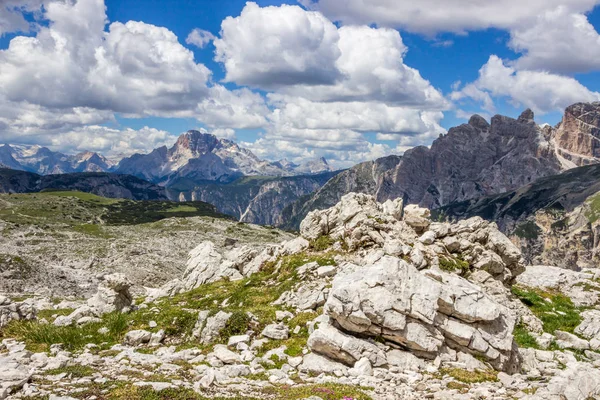 clouds over mountain trail in Dolomites