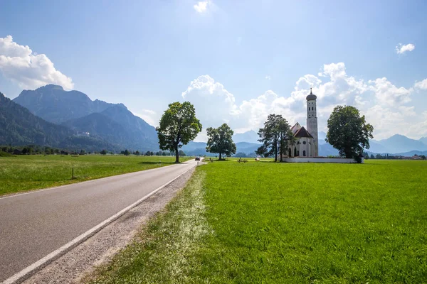 church by the road on a sunny day in bavaria, germany