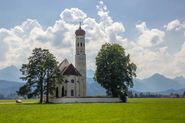 church by the road on a sunny day in bavaria, germany