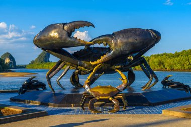 Krabi Town, Thailand, Statue monument of crabs near the river. clipart