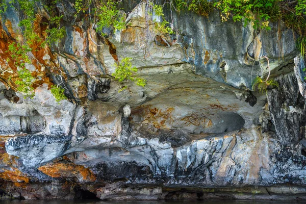 Ancient paintings on the rock, Ko Pan Yi, Ao Phang-nga National Park, Phang-nga, Thailand