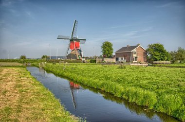 Hollanda ya da Hollanda 'daki Kinderdijk' teki yel değirmenleri ve su kanalları. Unesco Dünya Mirası Bölgesi. Avrupa. HDR