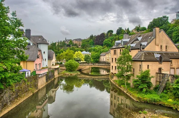 River with houses and bridges in Luxembourg in Benelux, HDR