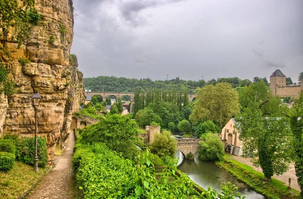 River with houses and bridges in Luxembourg in Benelux, HDR