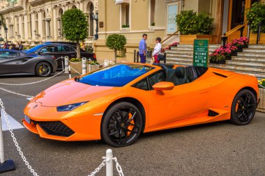 MONTE-CARLO, MONACO - JUN 2017: orange LAMBORGHINI HURACAN LB724 in La Condamine, Monte-Carlo, Monaco, Cote d'Azur, French Riviera clipart