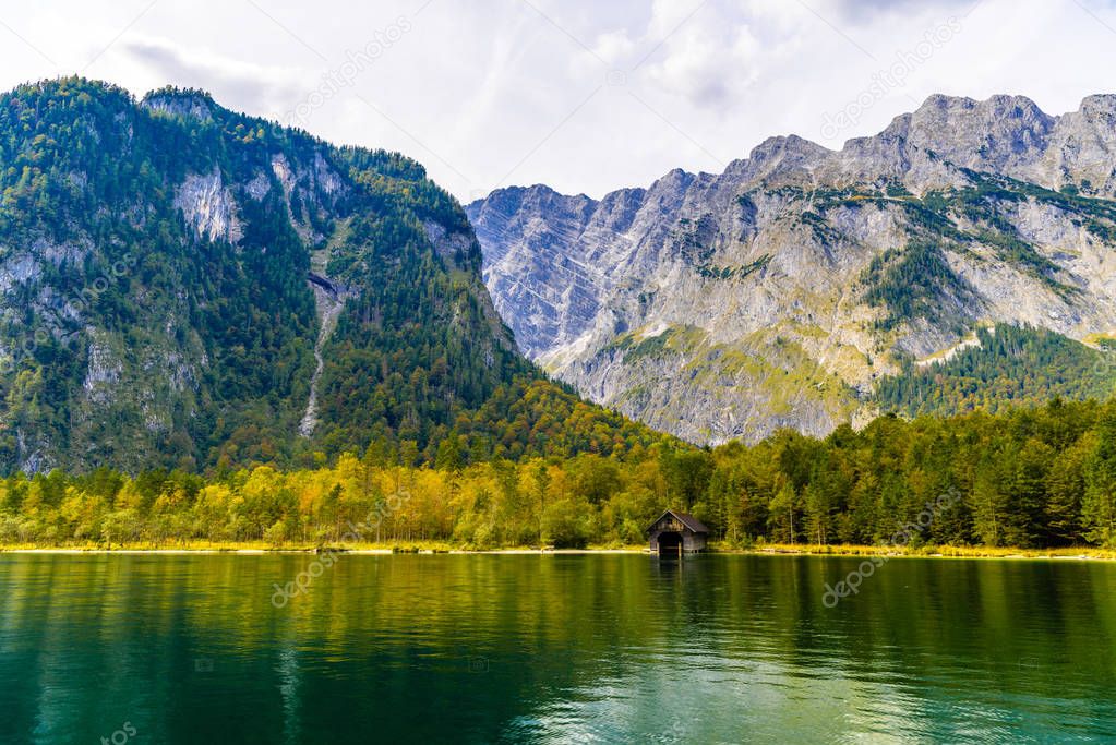 Wooden old fish house on the lake Koenigssee, Konigsee, Berchtesgaden National Park, Bavaria, Germany