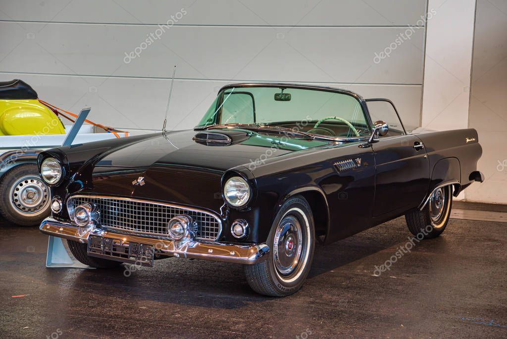 FRIEDRICHSHAFEN - MAY 2019: black FORD THUNDERBIRD T-BIRD 1955 cabrio at Motorworld Classics Bodensee on May 11, 2019 in Friedrichshafen, Germany.